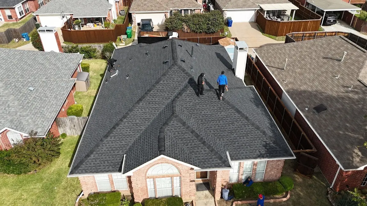 Slate & Tile Roof Repair work in progress on a Raytown property